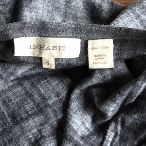 Inhabit top